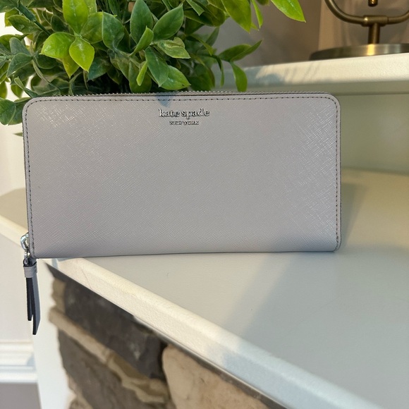 kate spade Handbags - Kate Spade Cameron gray Saffiano leather wallet